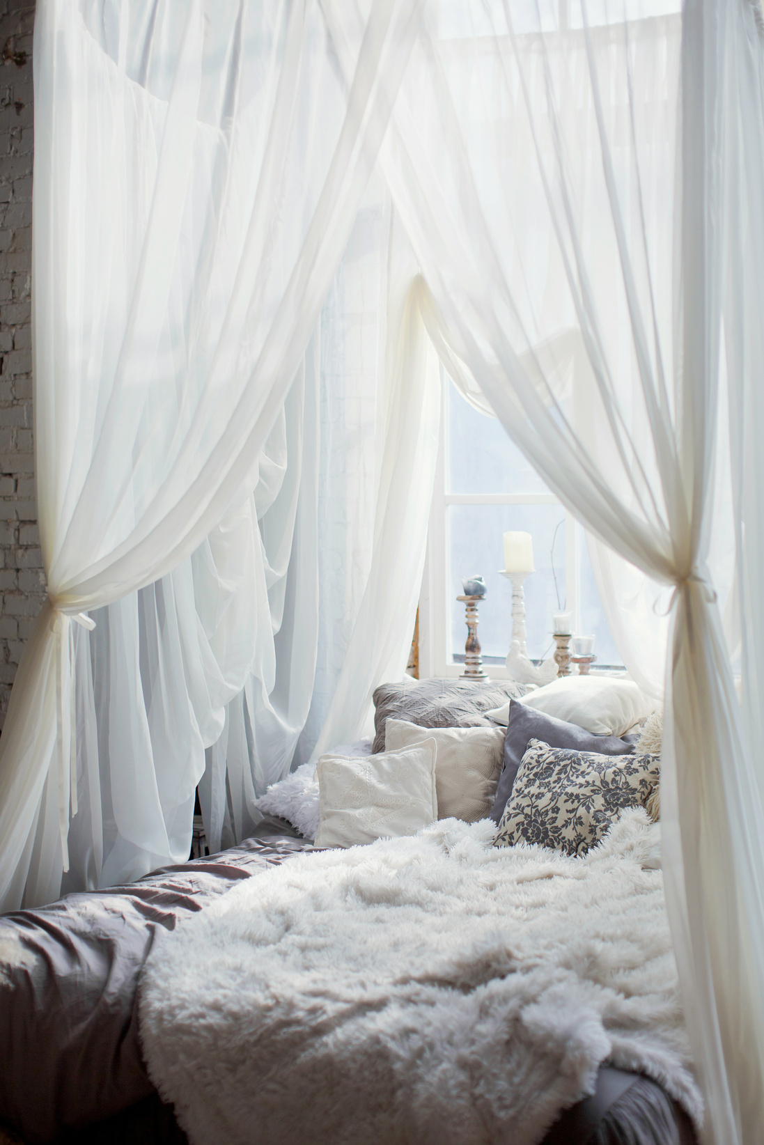 cozy bedroom with canopy